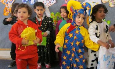 Children in costume at NAAMAT center